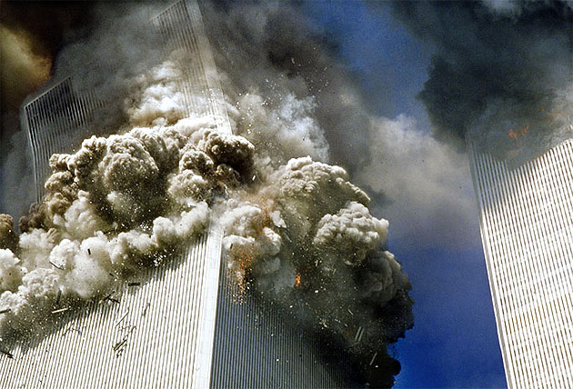 what year did twin towers collapse. how did twin towers collapse.